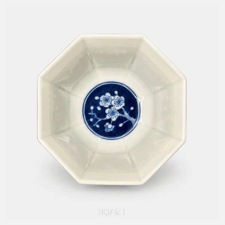 Inside a single drawn circle at the bottom, one short branch of plum blossom opens, and all eight faces above it are left bare.