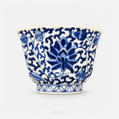 Between the rim and the foot, a scrolling lotus vine wraps all eight panels of this cup, with the largest bloom opening across the centre.