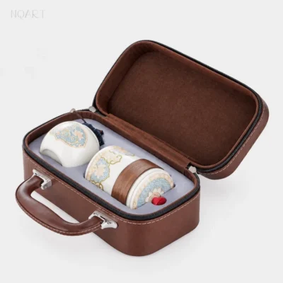 Opened out flat, the hard tea case shows two recesses cut to shape — the jar lying in one, the brewing cup and its lid in the other.