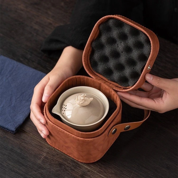 Inside the padded tea case, the bowl sits in the lower half while egg-crate foam fills the lid above it.